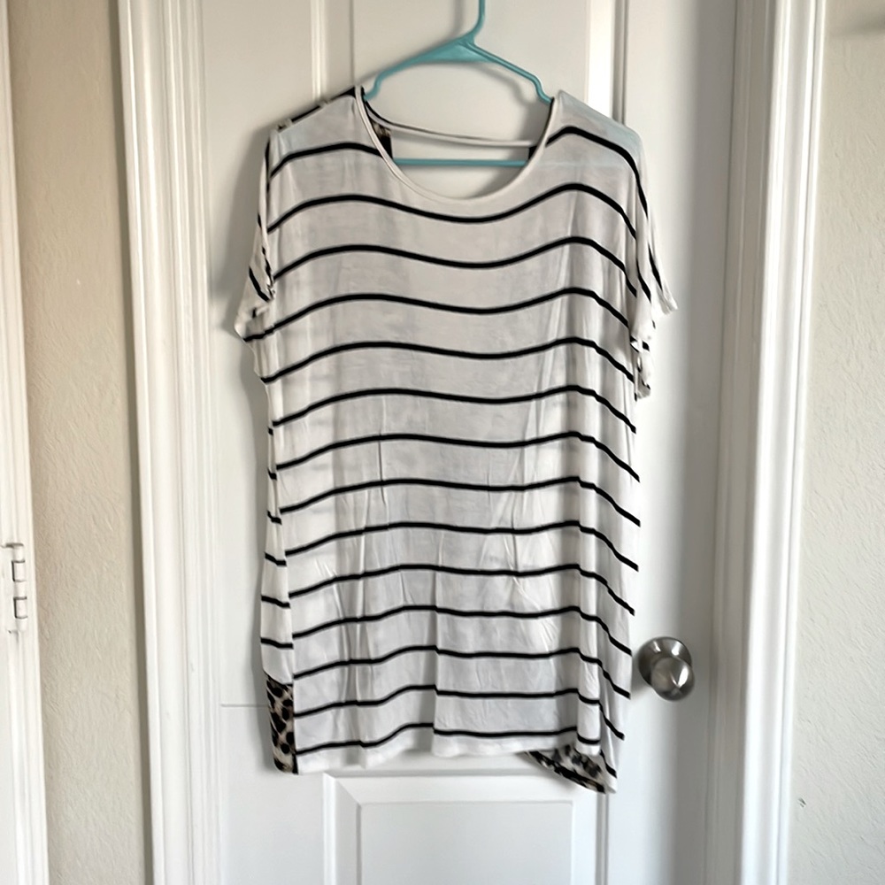 Black and white striped top with leopard print accent cross back